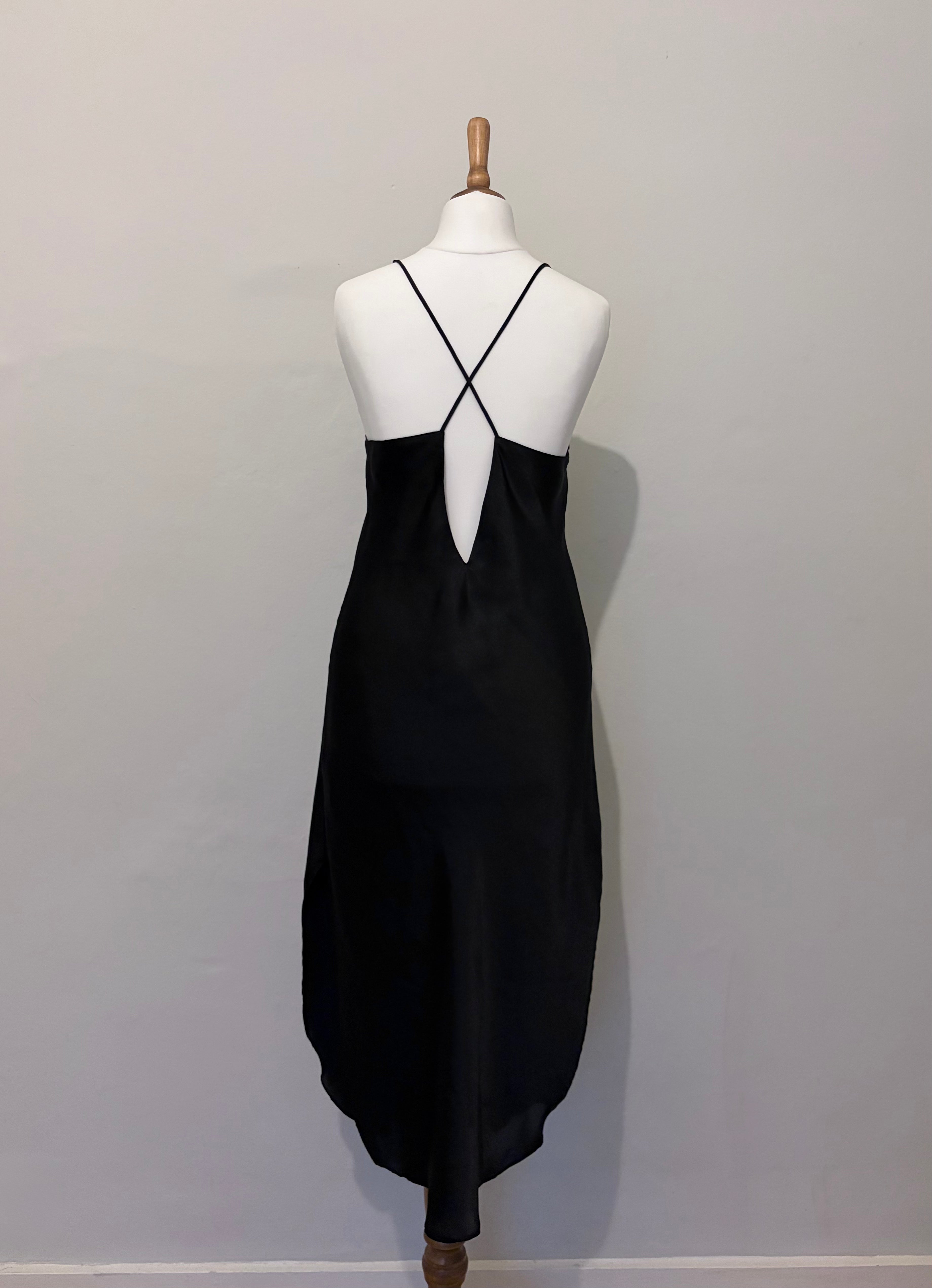 Black slip dress with tassel detail