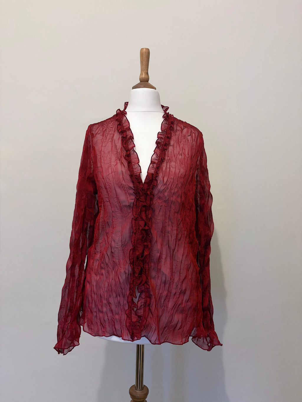 Red sheer top with ruffle detailing