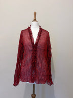 Red sheer top with ruffle detailing