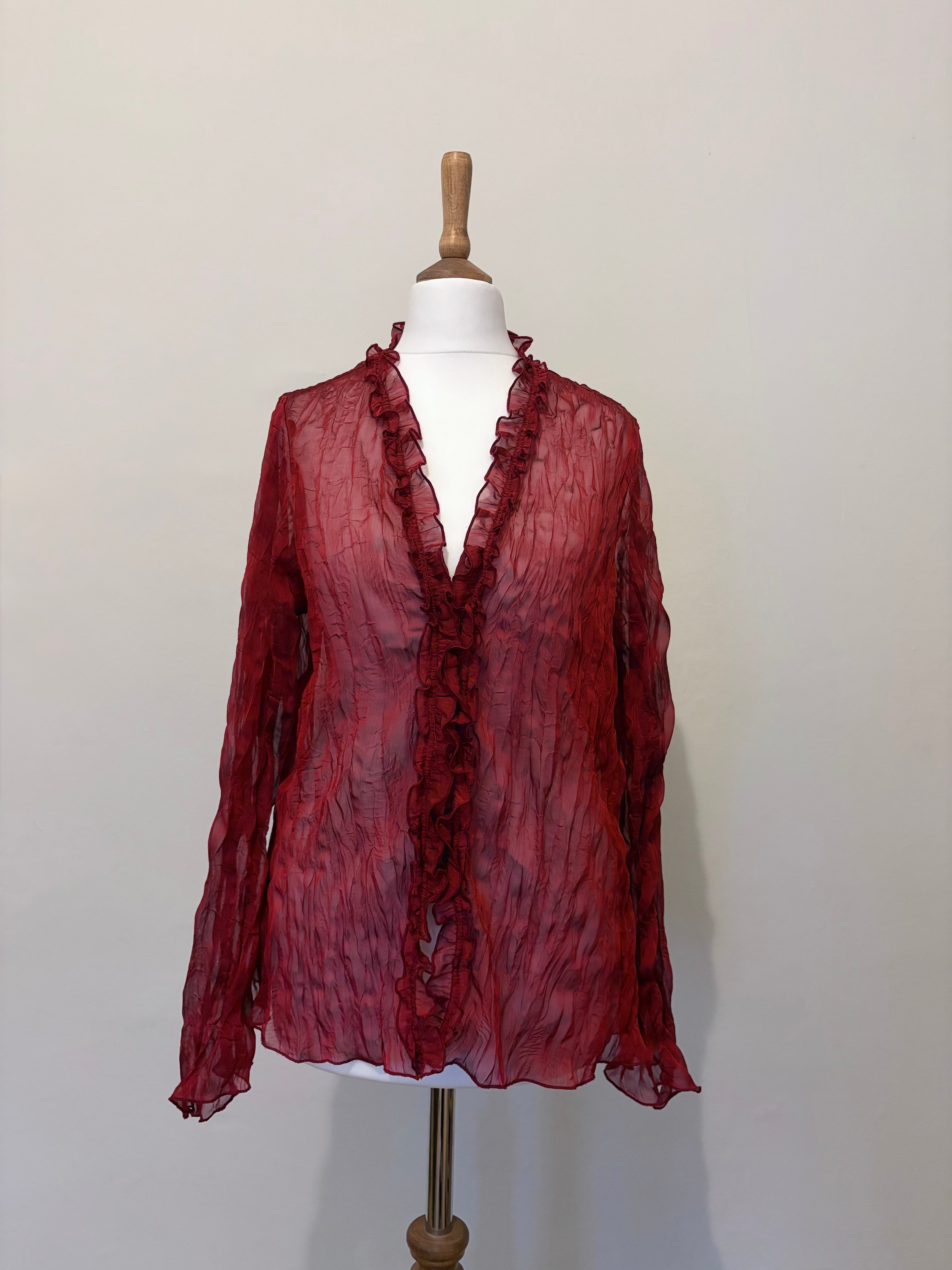 Red sheer top with ruffle detailing