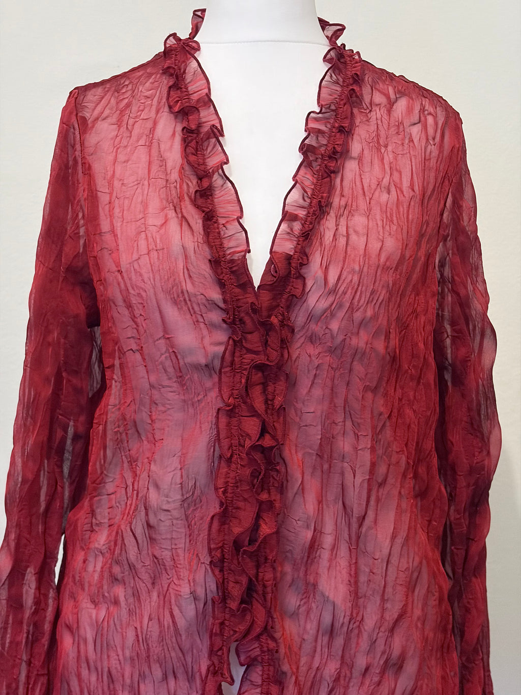 Red sheer top with ruffle detailing
