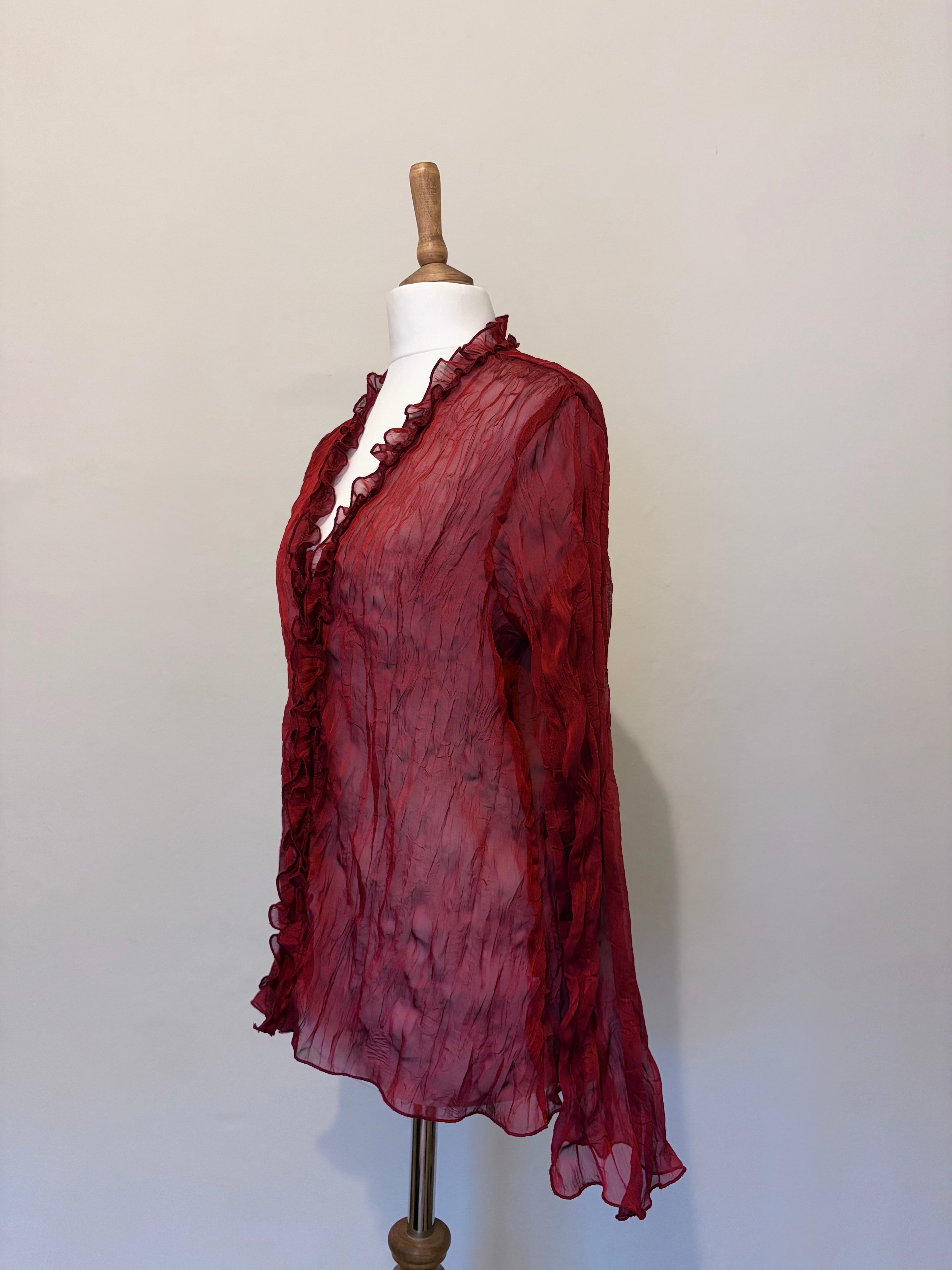 Red sheer top with ruffle detailing
