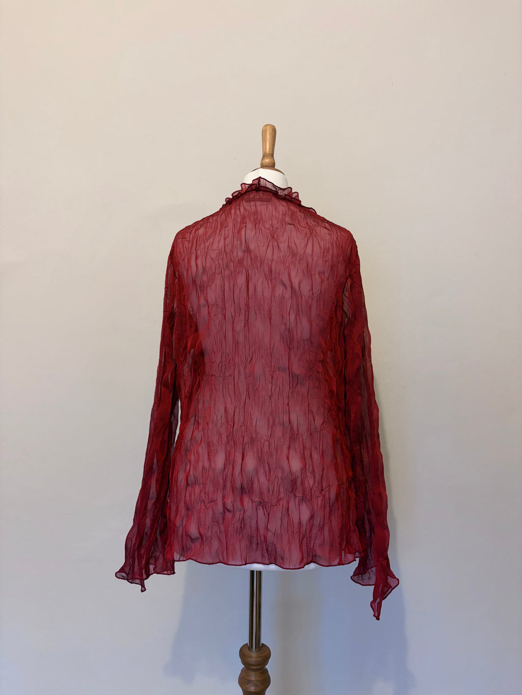 Red sheer top with ruffle detailing
