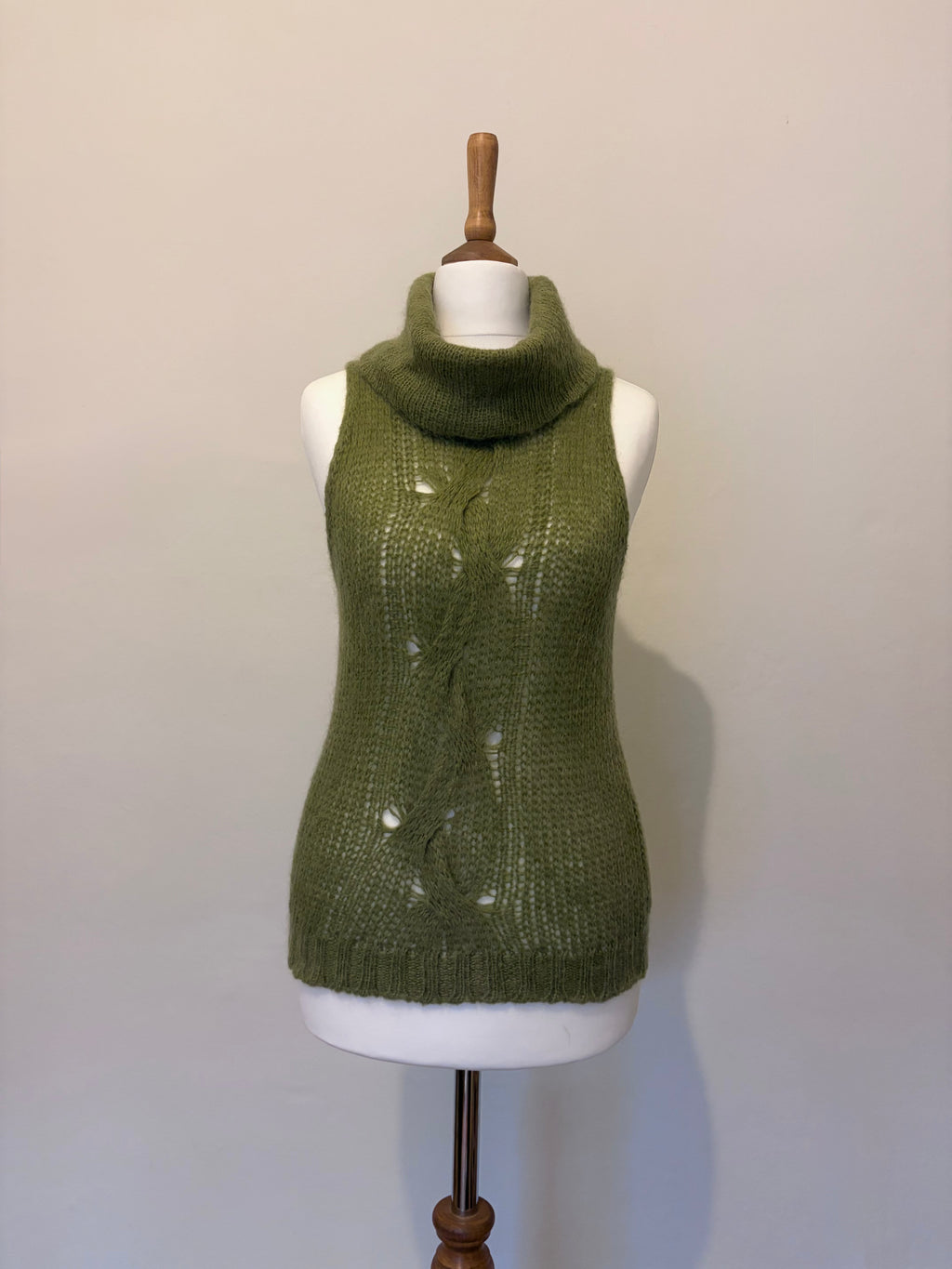 Green knitted roll neck jumper