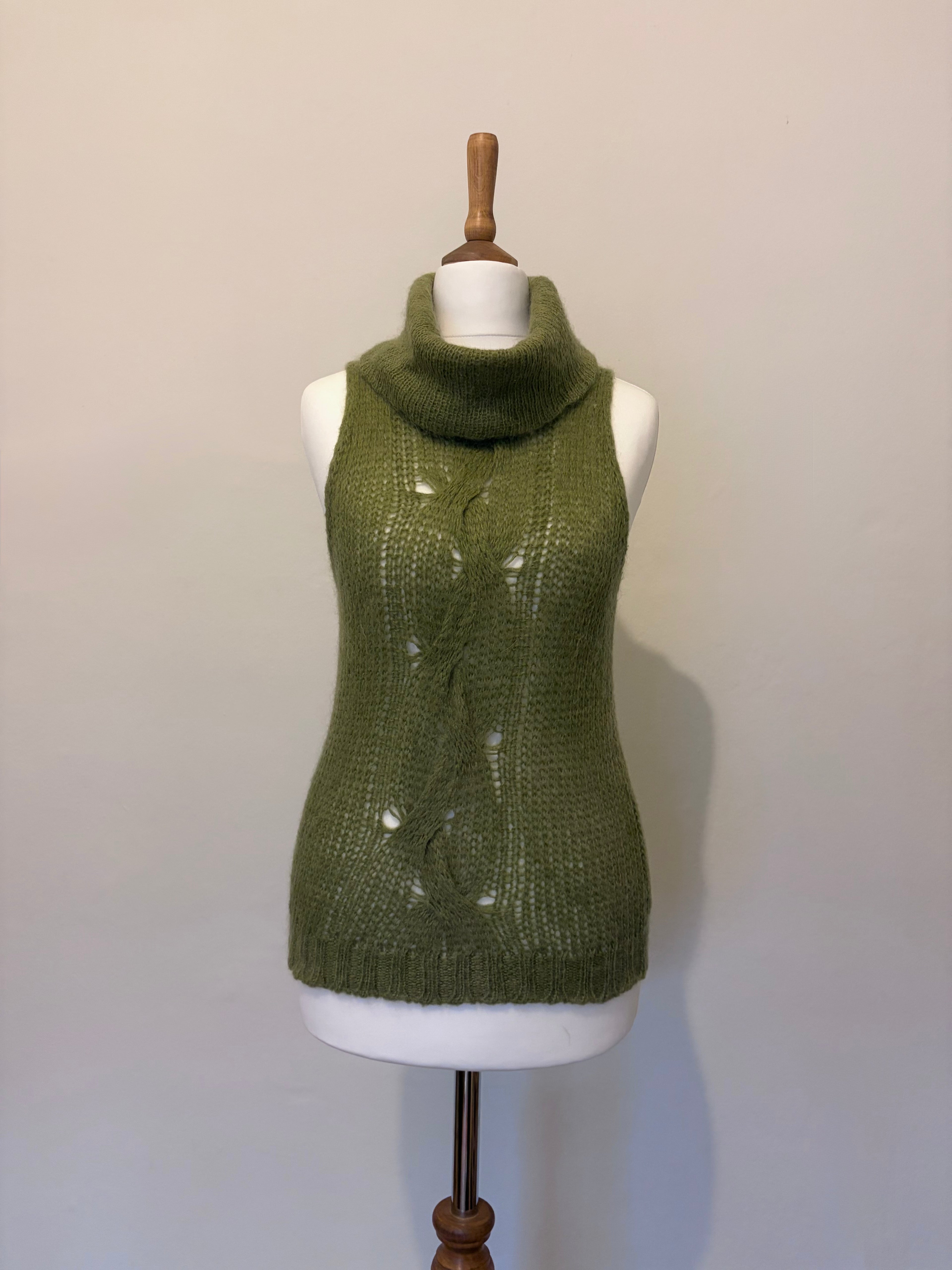 Green knitted roll neck jumper