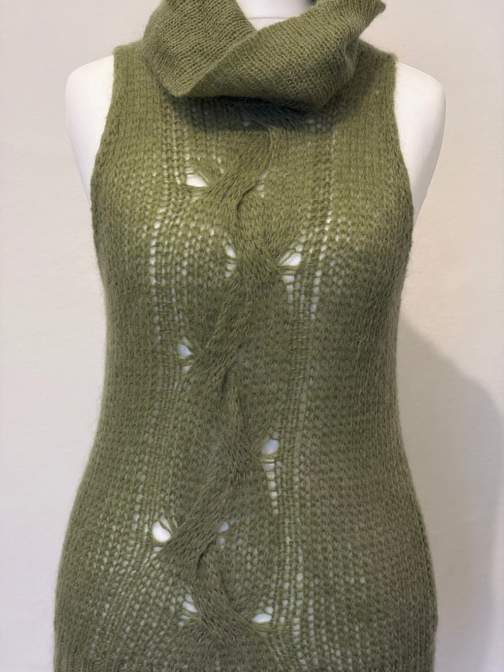Green knitted roll neck jumper