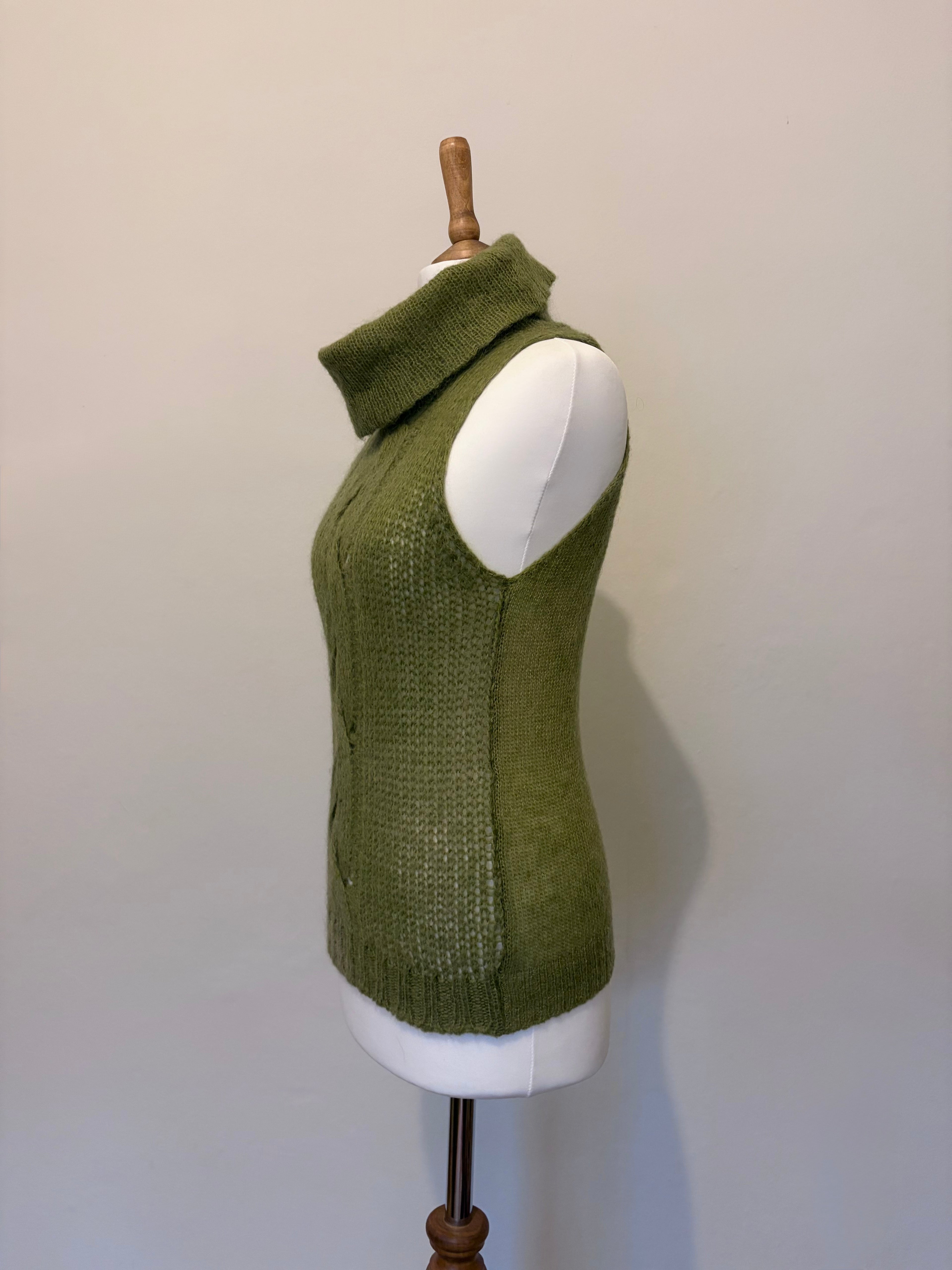 Green knitted roll neck jumper