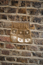 Gold woven chain strap bag