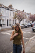 Green knitted roll neck jumper