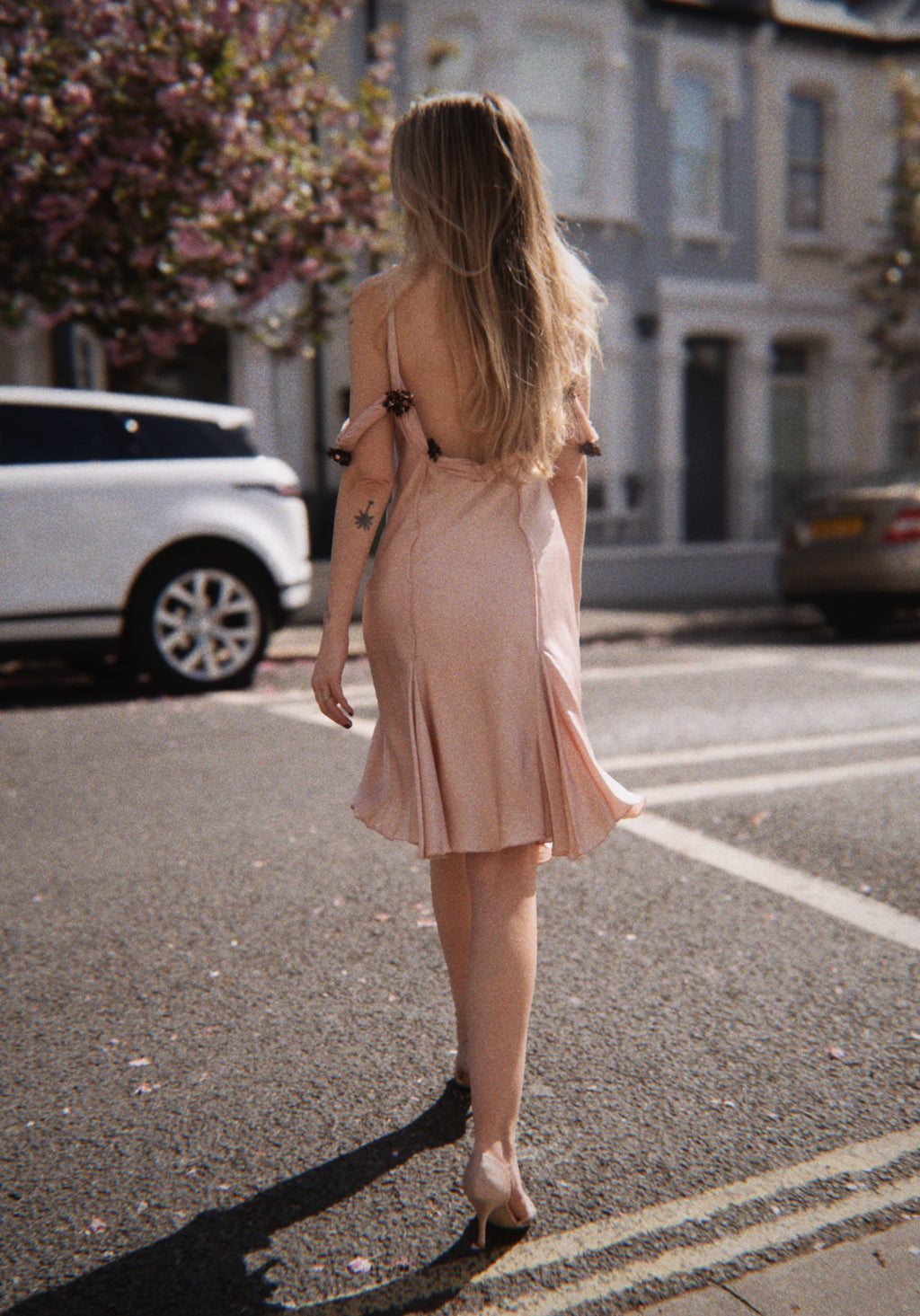 Blush satin dress with sequin flowers