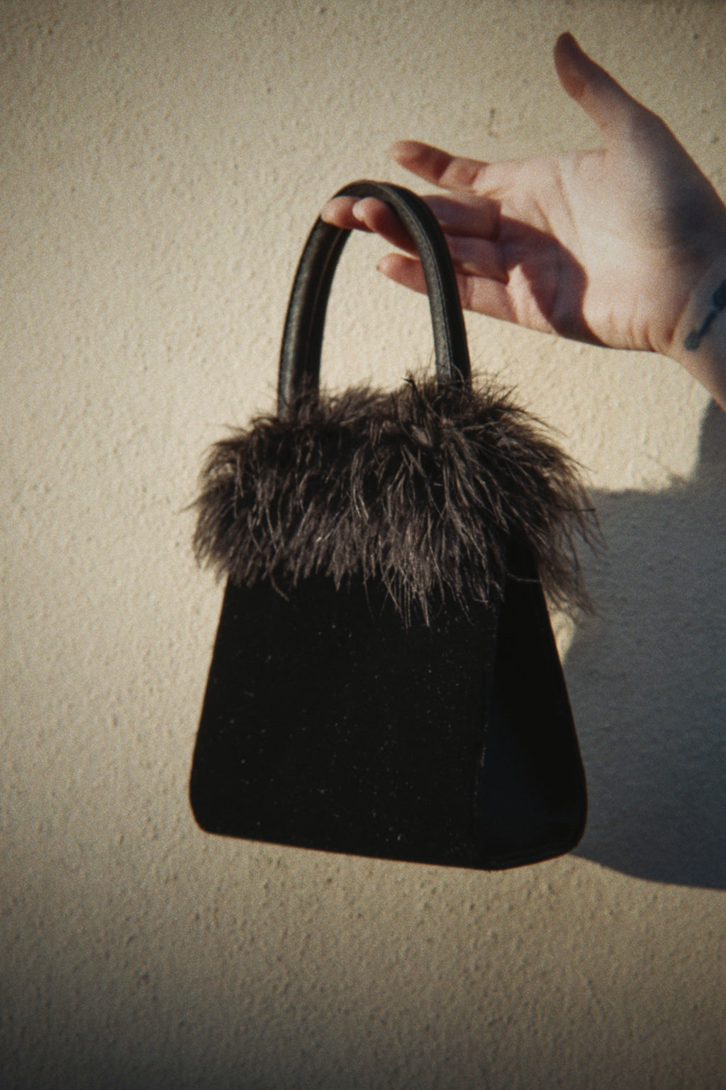 Velvet feather bag