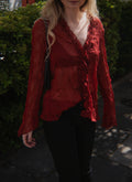Red sheer top with ruffle detailing