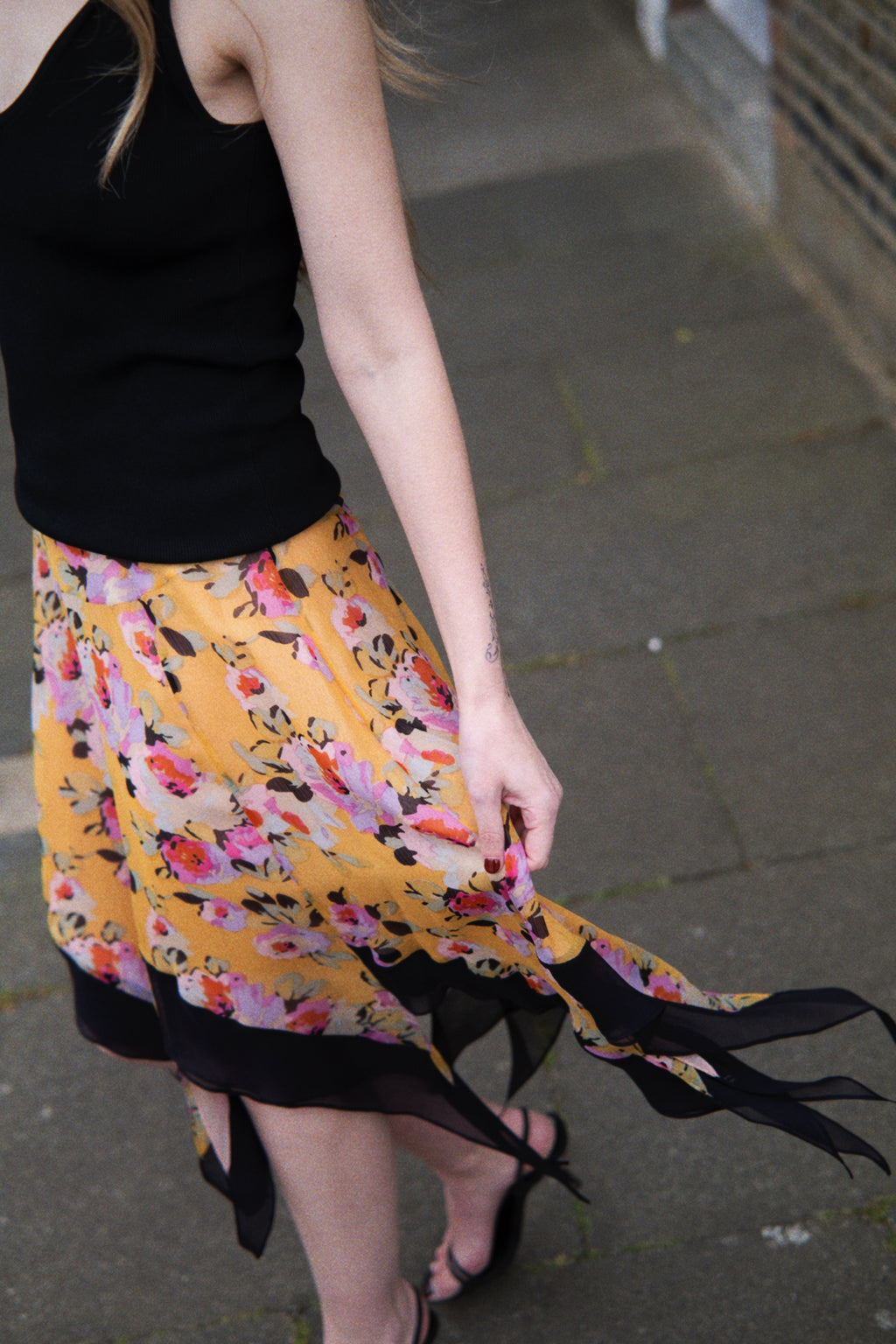 Floral midi skirt with asymmetric hem