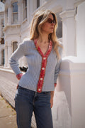 Blue cardigan with velvet and flower trim
