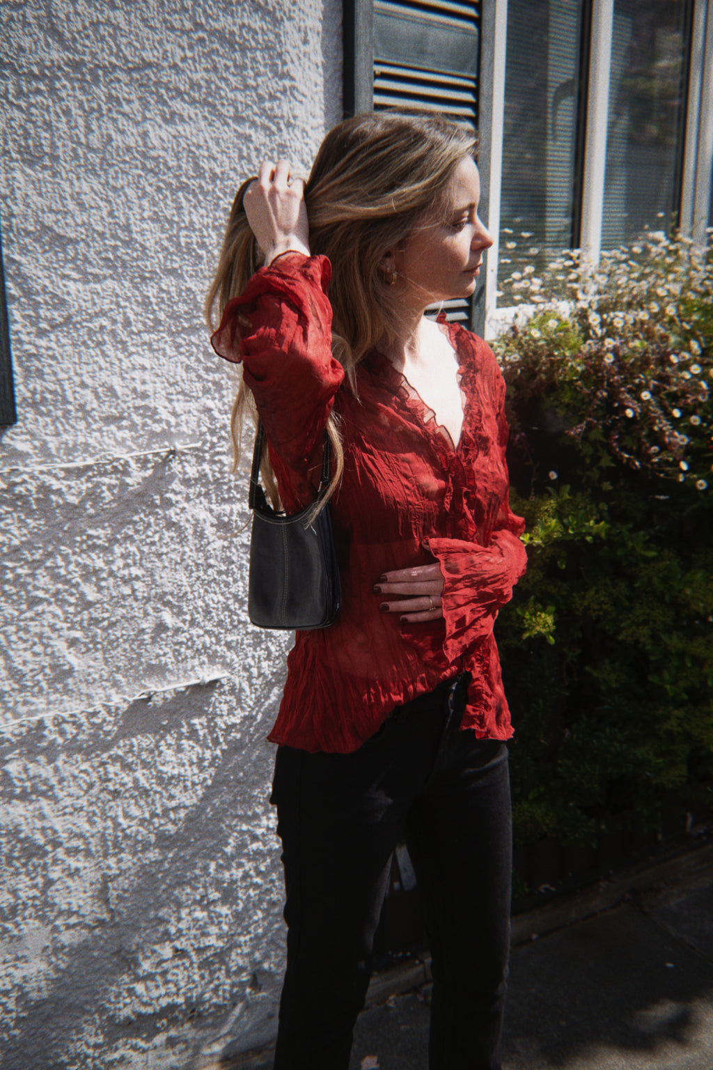 Red sheer top with ruffle detailing