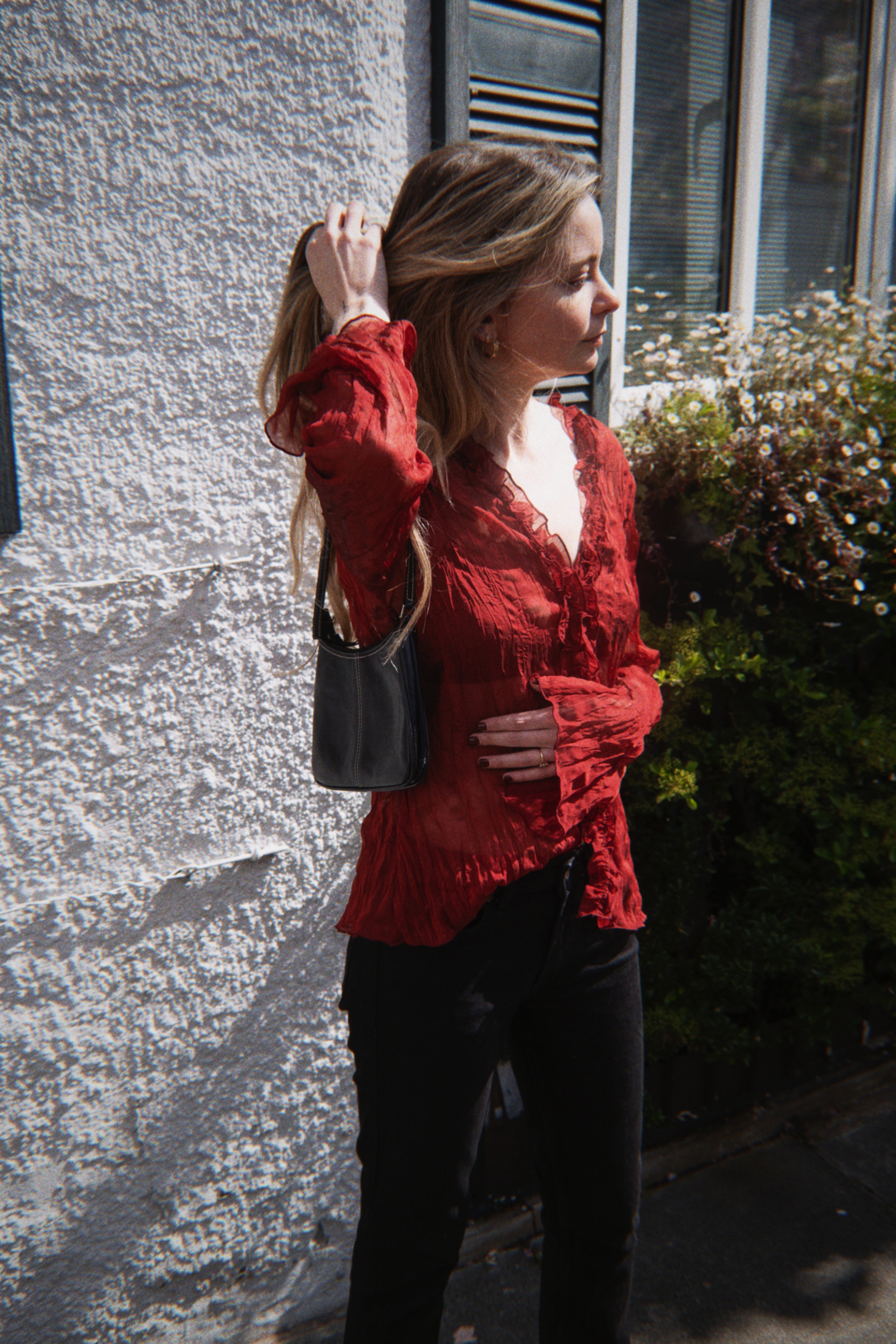 Red sheer top with ruffle detailing