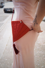 Pink fan bag with tassel