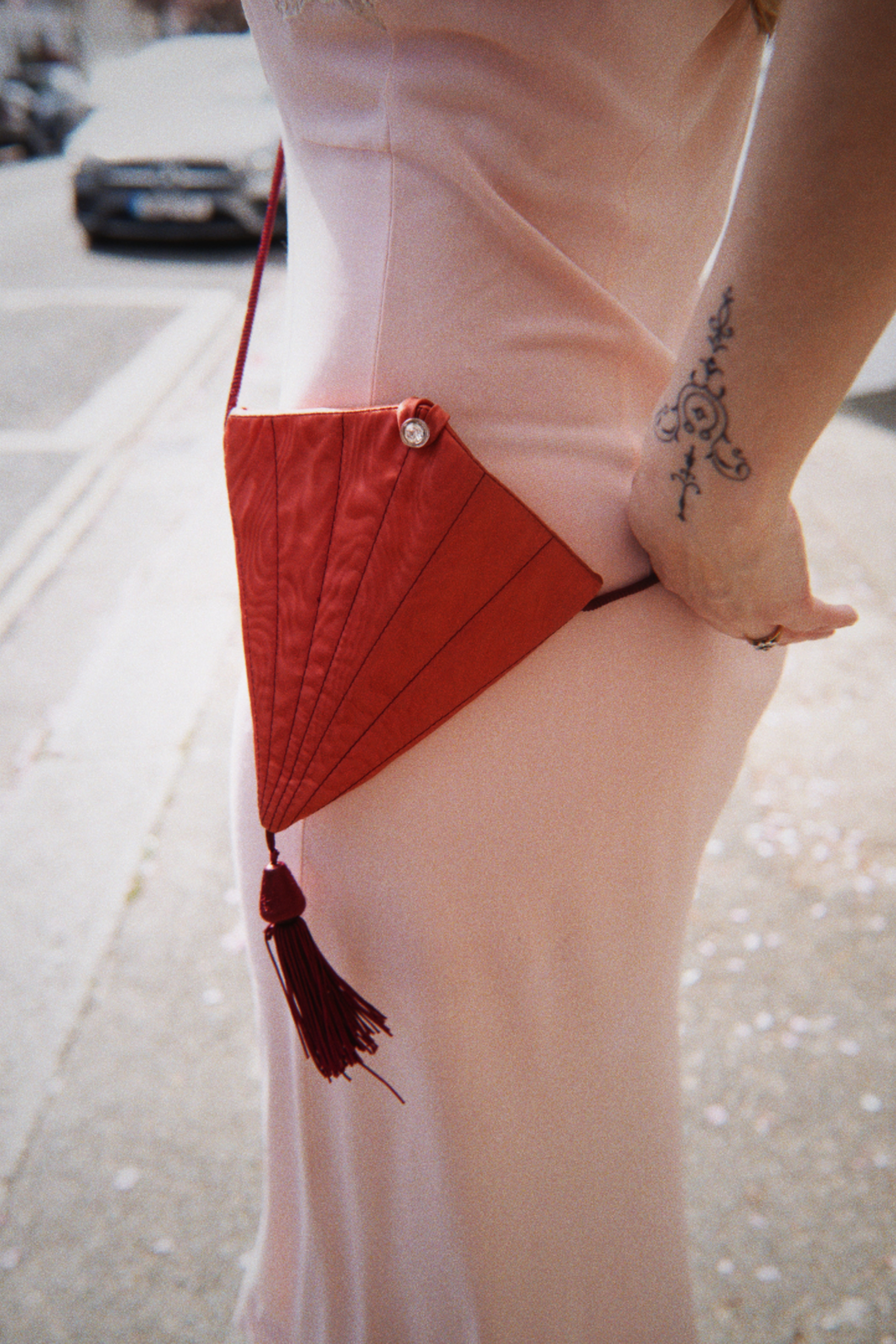 Pink fan bag with tassel
