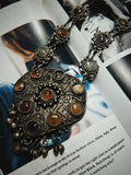 Ornate silver necklace