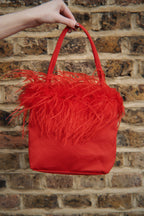 Red feather detail bag