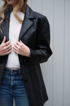 Black tailored leather jacket