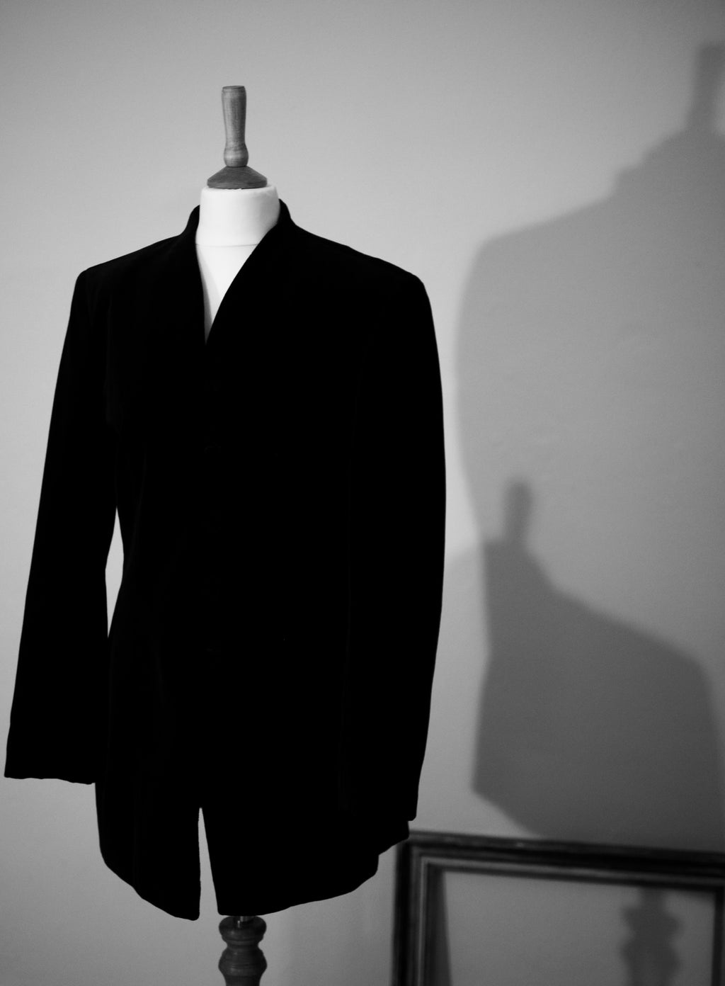 Black velvet jacket with covered buttons